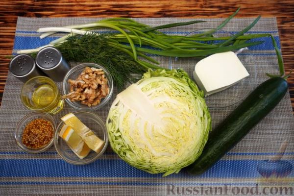 Салат из молодой капусты с огурцами, фетой и орехами